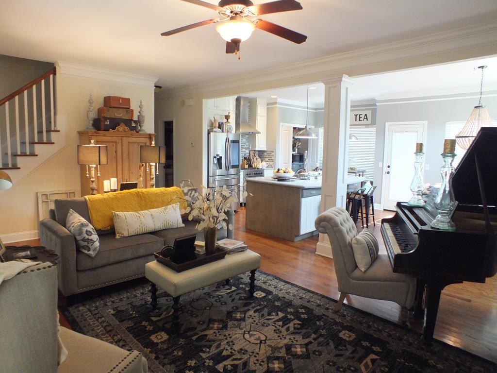 5641 Tucker Road Ooltewah, TN 37363 - Photo 15 of 53 a living room with furniture or couch and a chandelier