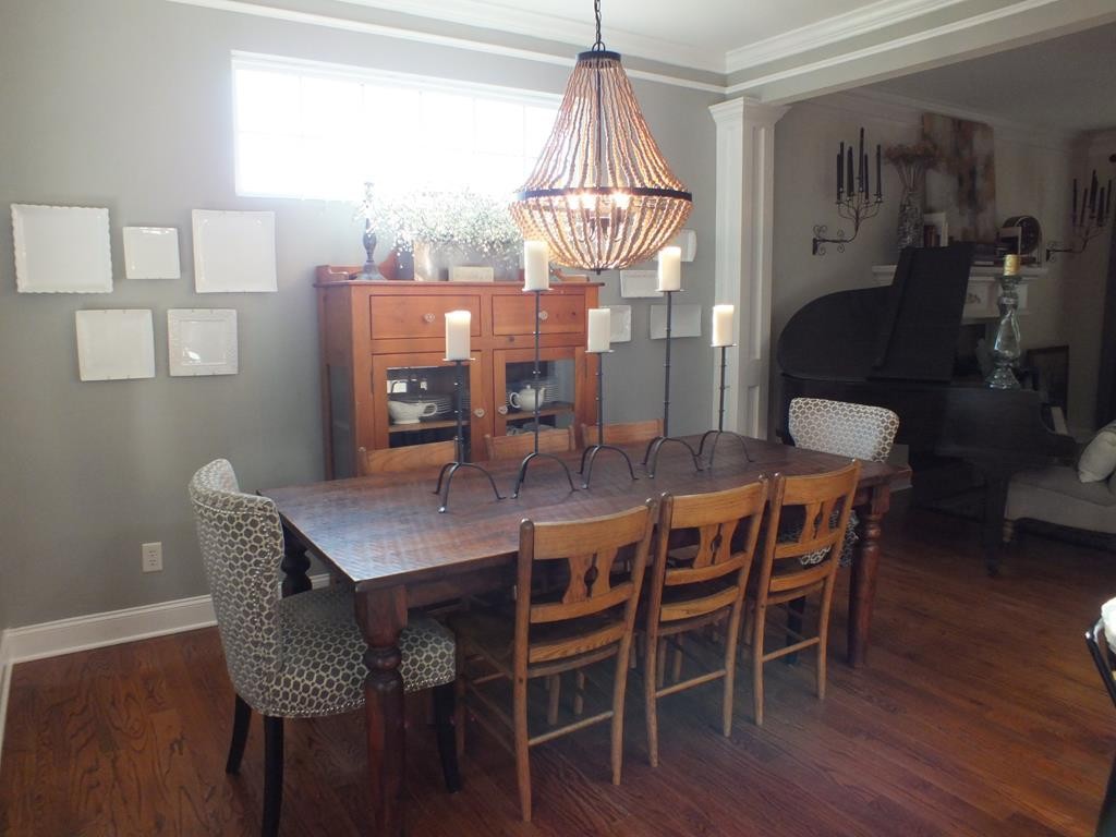 5641 Tucker Road Ooltewah, TN 37363 - Photo 28 of 53 a view of a dining room with furniture and wooden floor