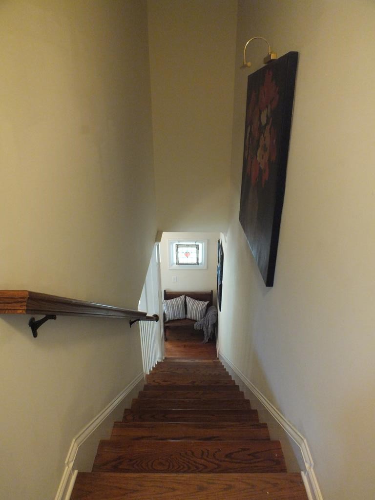 5641 Tucker Road Ooltewah, TN 37363 - Photo 39 of 53 a view of a hallway with wooden floor and staircase
