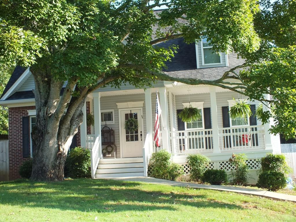 5641 Tucker Road Ooltewah, TN 37363 - Photo 4 of 53 a view of a house with a yard