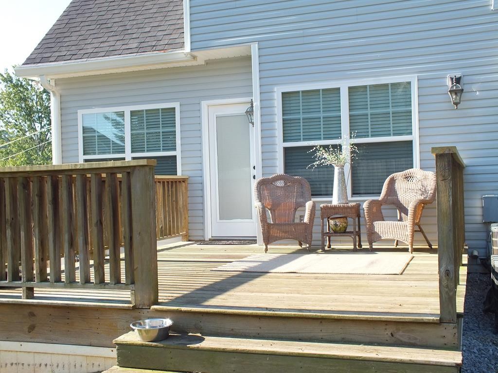 5641 Tucker Road Ooltewah, TN 37363 - Photo 8 of 53 a view of a two chairs in the patio