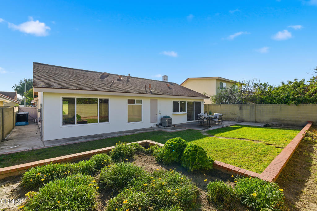 13151 Rose Street Cerritos, CA 90703 - Photo 22 of 24 a view of a house with backyard and sitting area