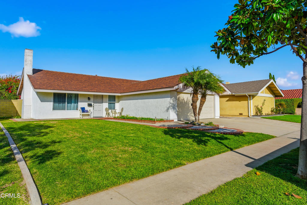 13151 Rose Street Cerritos, CA 90703 - Photo 24 of 24 a front view of house with yard and green space