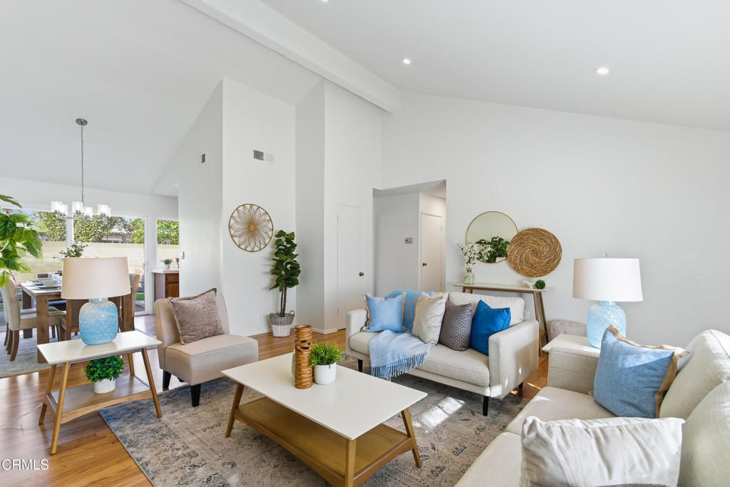 13151 Rose Street Cerritos, CA 90703 - Photo 4 of 24 a living room with furniture potted plant and a large window