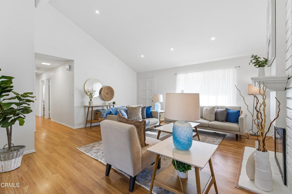 13151 Rose Street Cerritos, CA 90703 - Photo 5 of 24 a living room with furniture and a potted plant