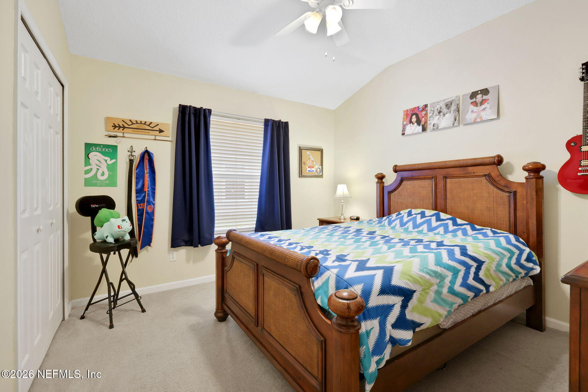 4320 Rye Court St. Johns, FL 32259 - Photo 38 of 60 a bedroom with a bed and a chandelier