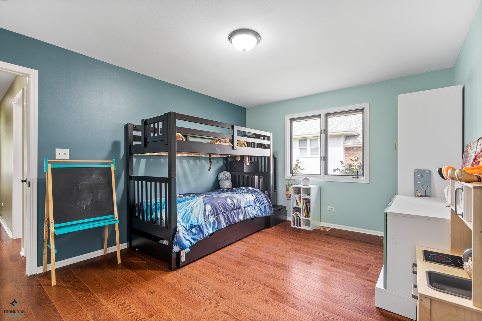 1224 Arbor Drive Lemont, IL 60439 - Photo 17 of 27 a bedroom with a bed and a window