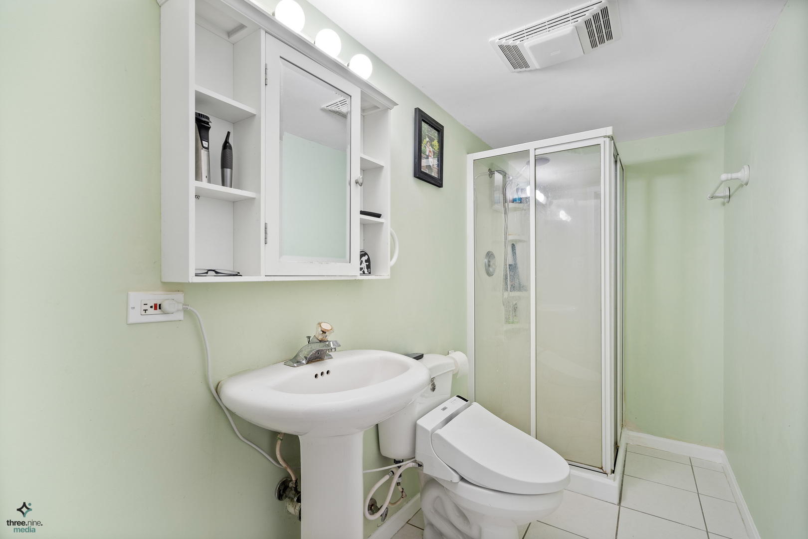 1224 Arbor Drive Lemont, IL 60439 - Photo 24 of 27 a bathroom with a sink toilet and shower