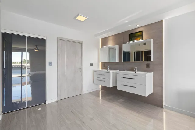 a living room with furniture and flat screen tv