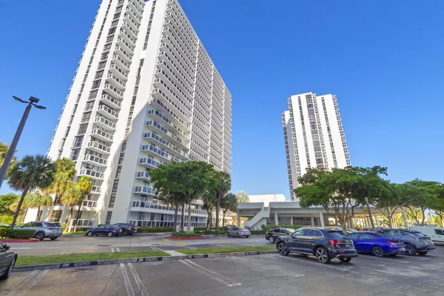 front view of a building with a yard