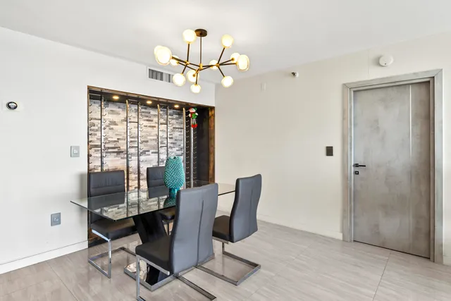 a view of a dining room with furniture window and outside view