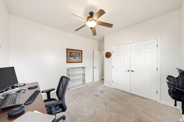 7776 Wagon Road East St. George, UT 84770 - Photo 32 of 76 Office area featuring light carpet and a ceiling fan