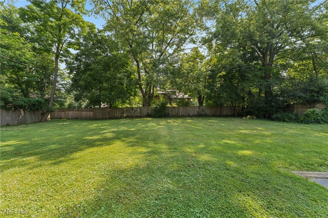 2911 Lee Road Cleveland, OH 44120 - Photo 49 of 50 Fenced backyard featuring view of scattered trees
