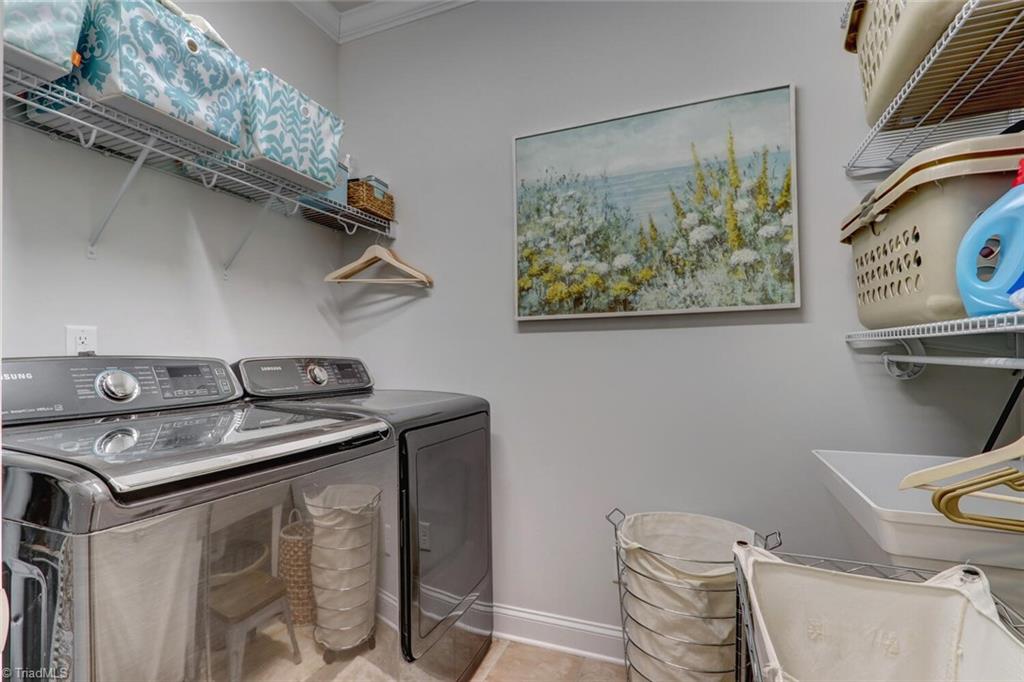 6526 Marion Gibson Way Oak Ridge, NC 27310 - Photo 13 of 27 MAIN LEVEL LAUNDRY