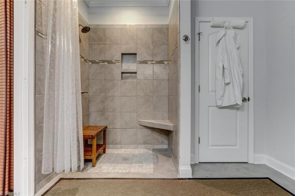6526 Marion Gibson Way Oak Ridge, NC 27310 - Photo 18 of 27 NEW WALK IN TILE SHOWER IN MASTER BATHROOM