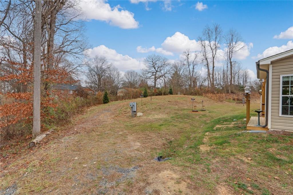 6526 Marion Gibson Way Oak Ridge, NC 27310 - Photo 25 of 27 VIEW OF COMMON AREA BEHIND HOME