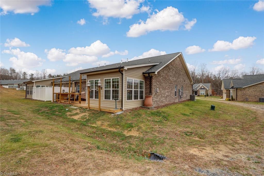 6526 Marion Gibson Way Oak Ridge, NC 27310 - Photo 26 of 27 REAR OF UNIT