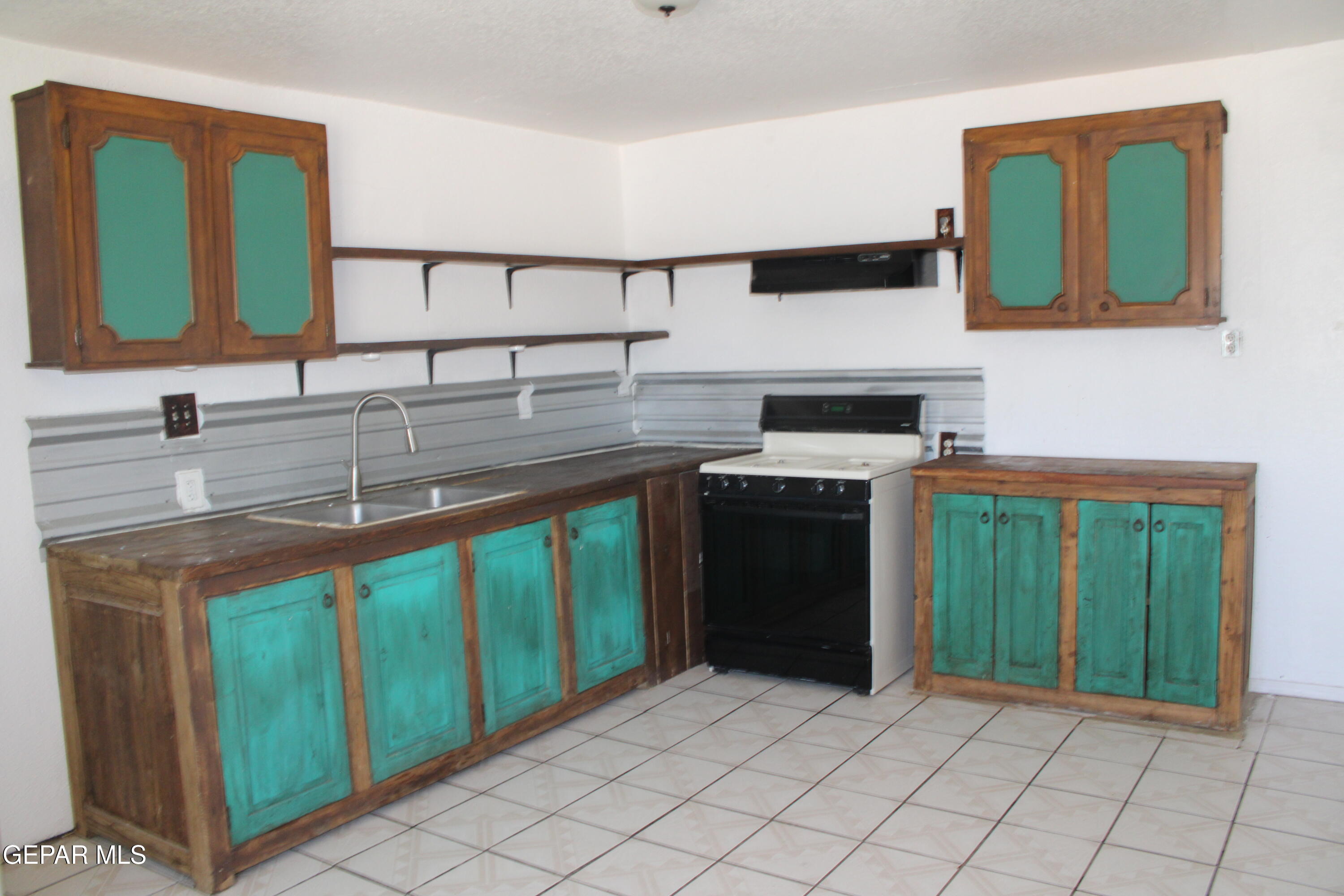 1368 Reid Road, Unit B Socorro, TX 79927 - Photo 5 of 13 IMG_4621
