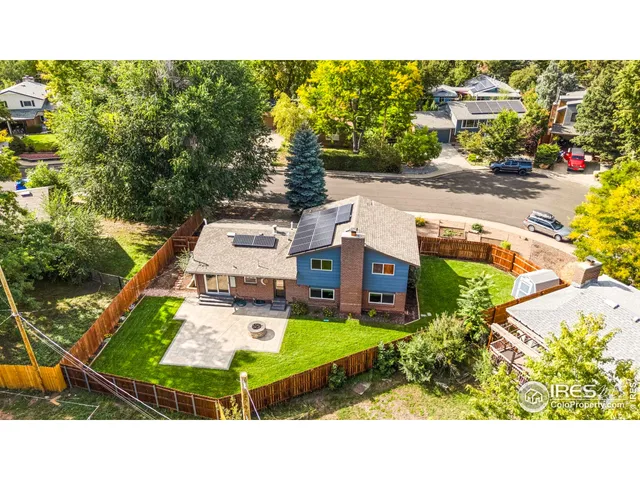 a view of a swimming pool with a garden
