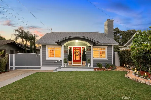 a view of a house with a swimming pool
