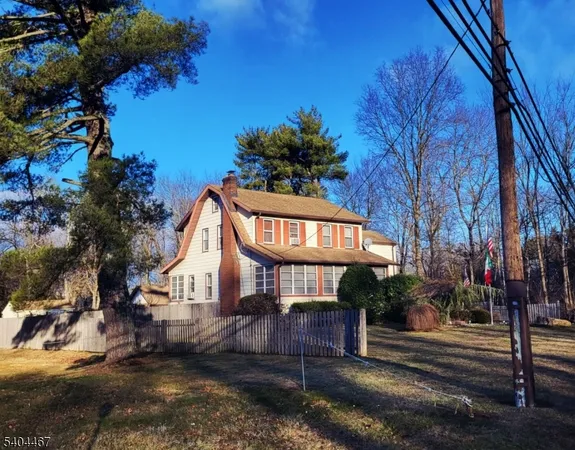 a view of a backyard of the house