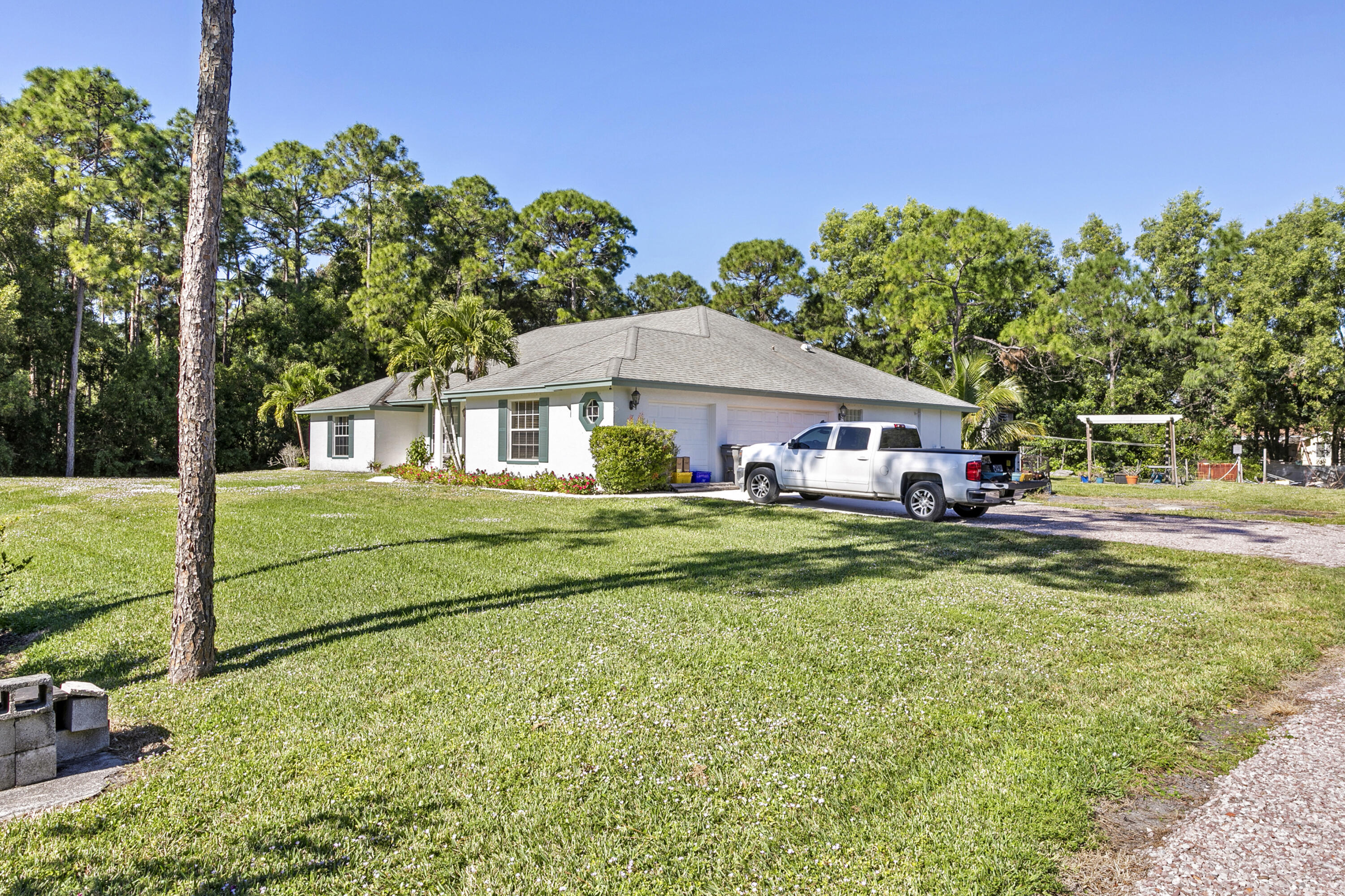 12783 85th Road North The Acreage, FL 33412 - Photo 2 of 37 Front_02