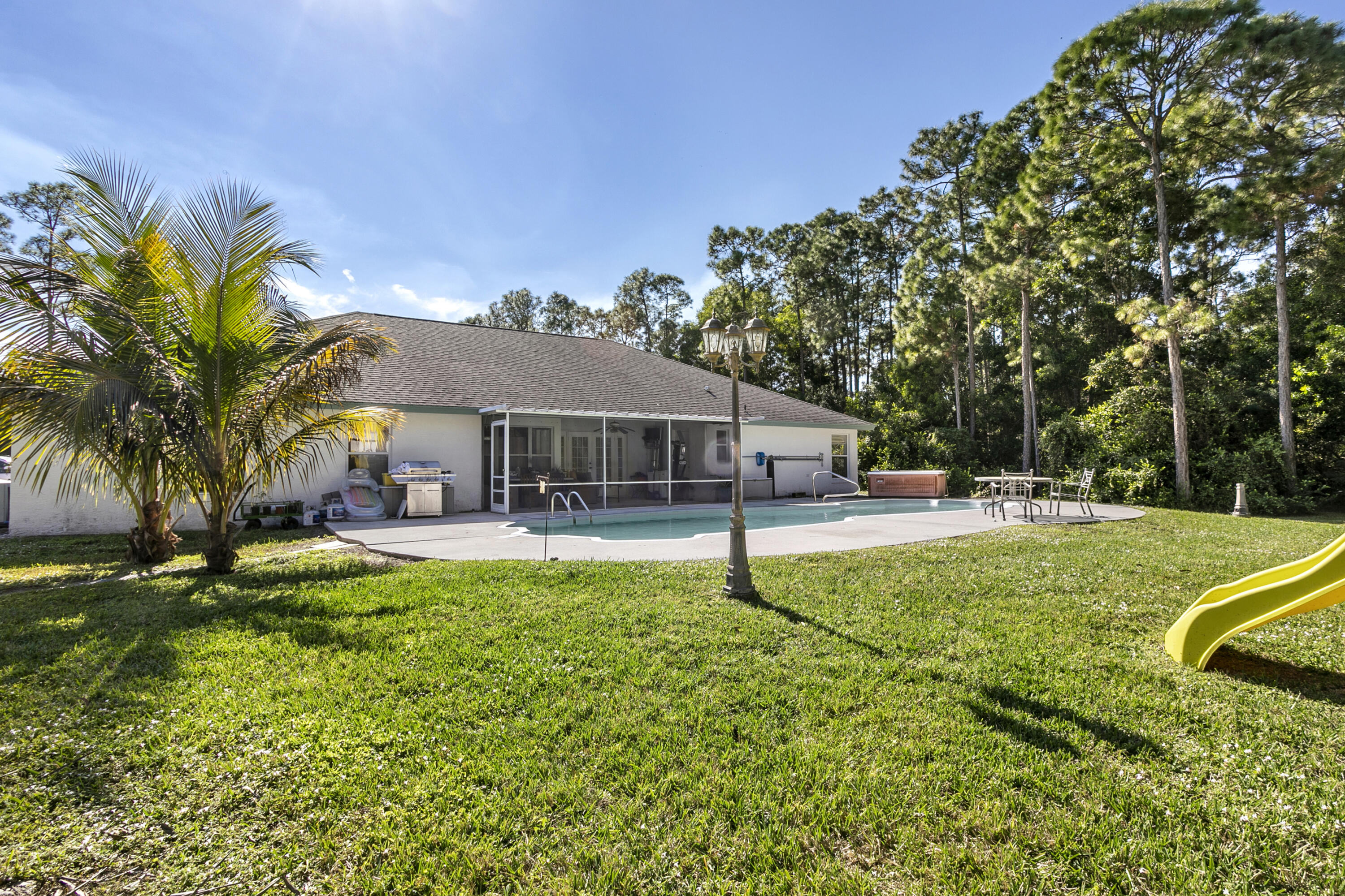 12783 85th Road North The Acreage, FL 33412 - Photo 4 of 37 Back_Yard_01