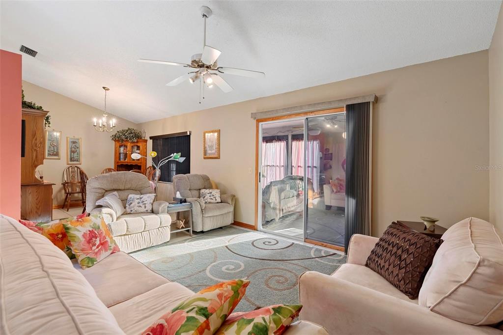 2573 Delaware Road Deltona, FL 32738 - Photo 13 of 31 living room 2