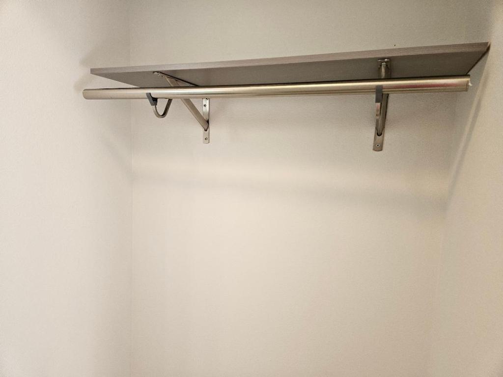 105 Ila Street, Unit B Elgin, TX 78621 - Photo 7 of 12 Other side of the closet in the primary bedroom