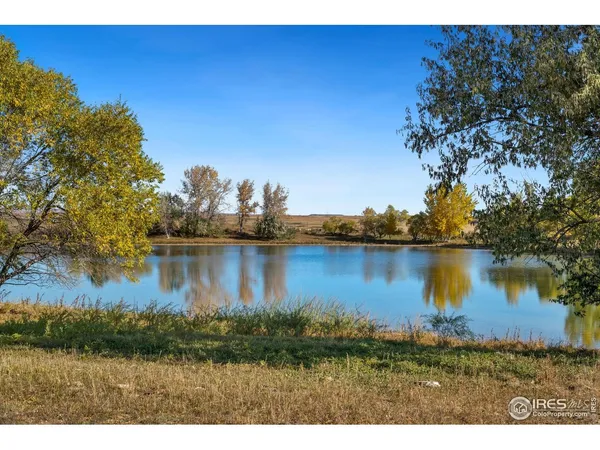 a view of lake with green space