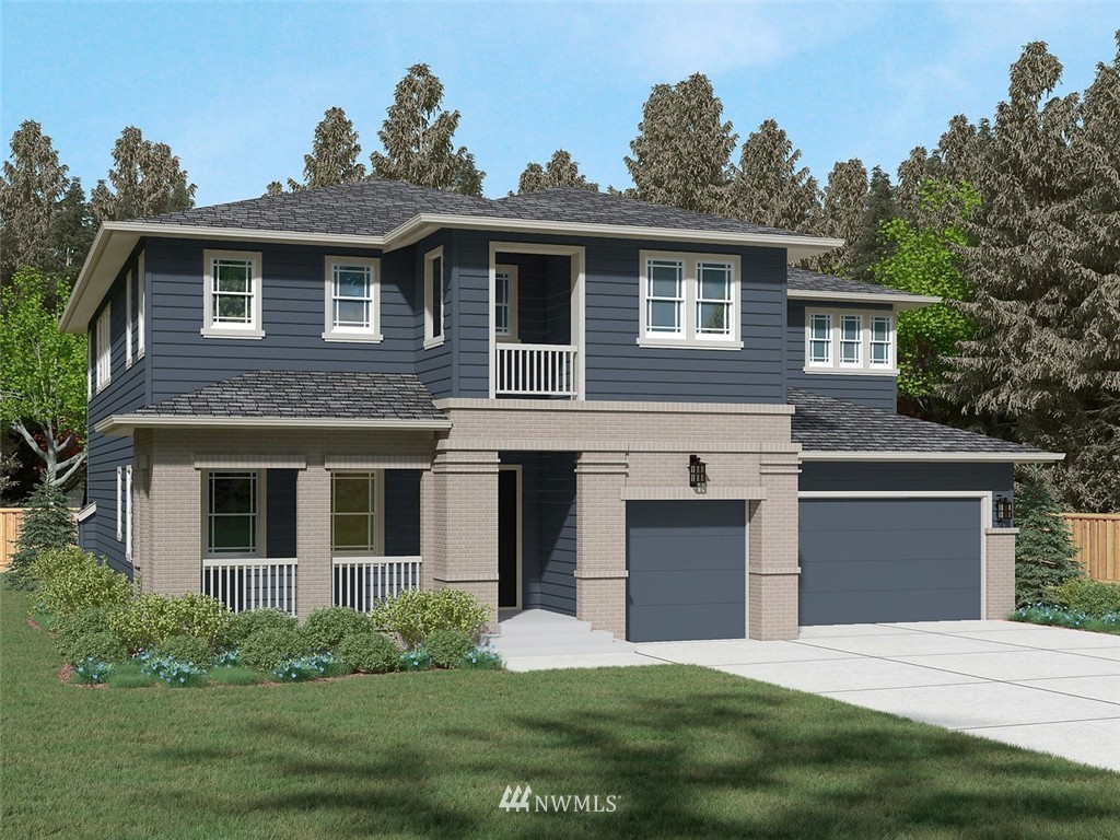 3334 219th Place Southeast, Unit 11 Bothell, WA 98021 - Photo 1 of 25 a front view of a house with a garden and yard