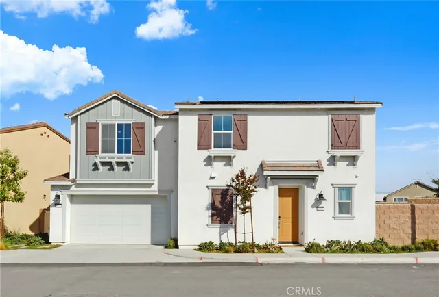 front view of a house with a street