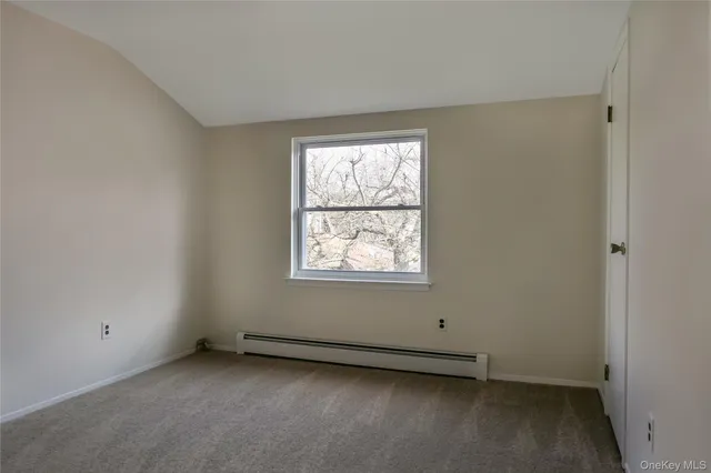 an empty room with window