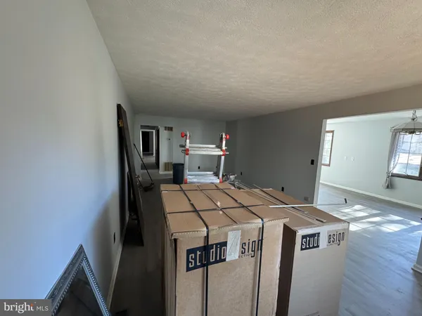 a kitchen with stainless steel appliances granite countertop a stove and a sink