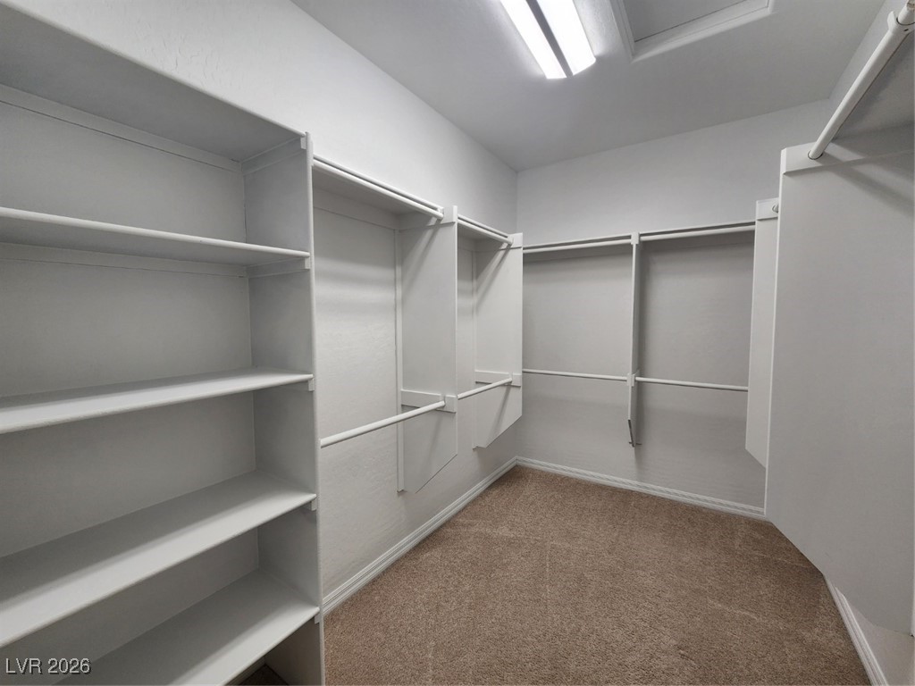 7022 Cordite Road Las Vegas, NV 89178 - Photo 35 of 51 Spacious closet featuring light colored carpet