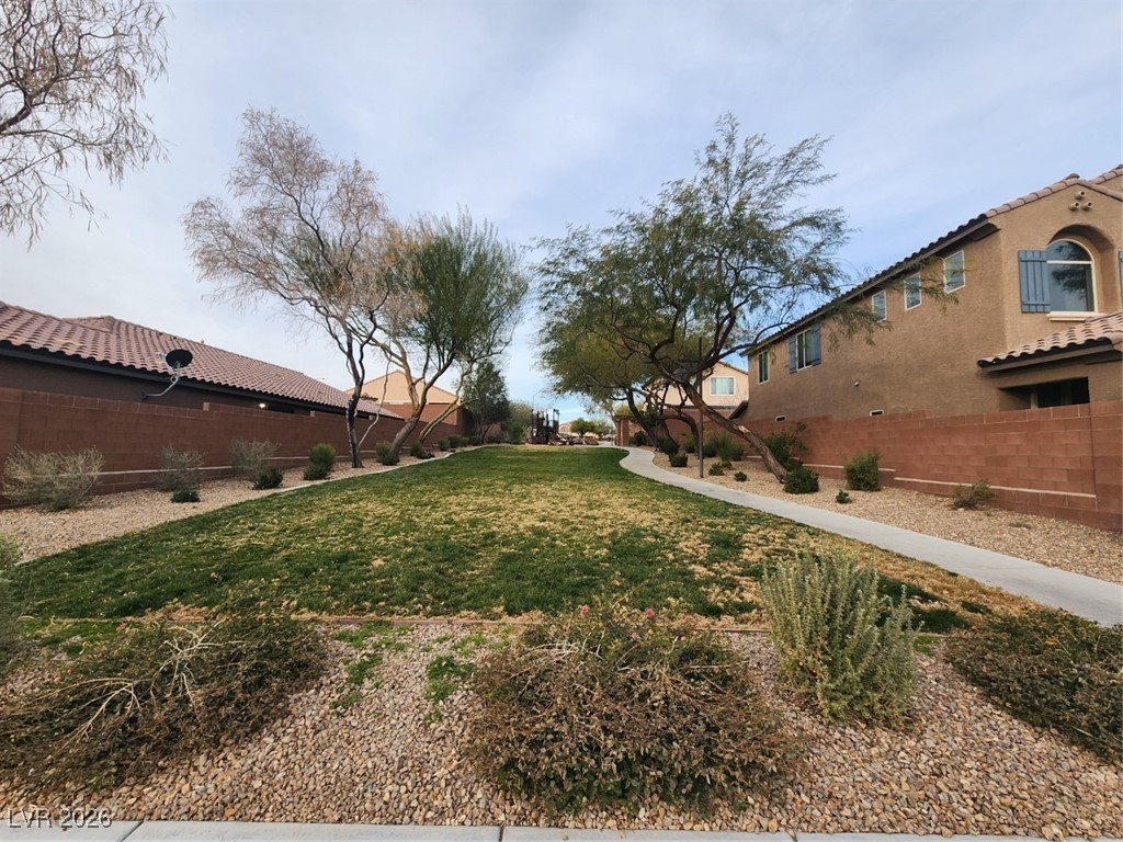 7022 Cordite Road Las Vegas, NV 89178 - Photo 46 of 51 View of yard with a residential view