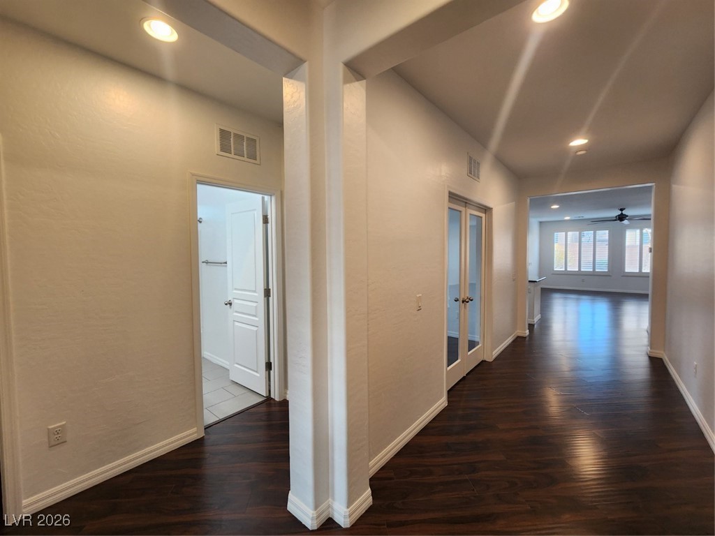 7022 Cordite Road Las Vegas, NV 89178 - Photo 5 of 51 Hall featuring recessed lighting, dark wood-style flooring, and french doors