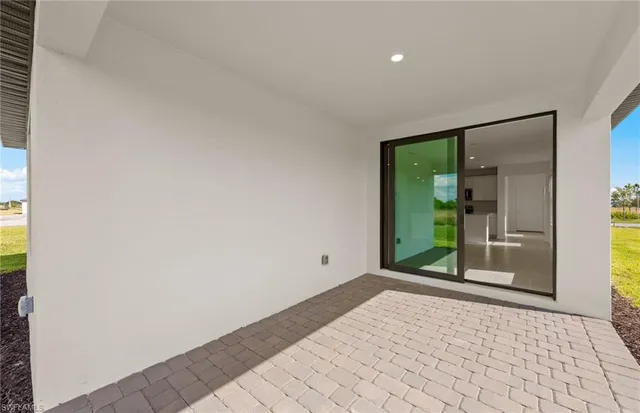 a view of a room with a large window