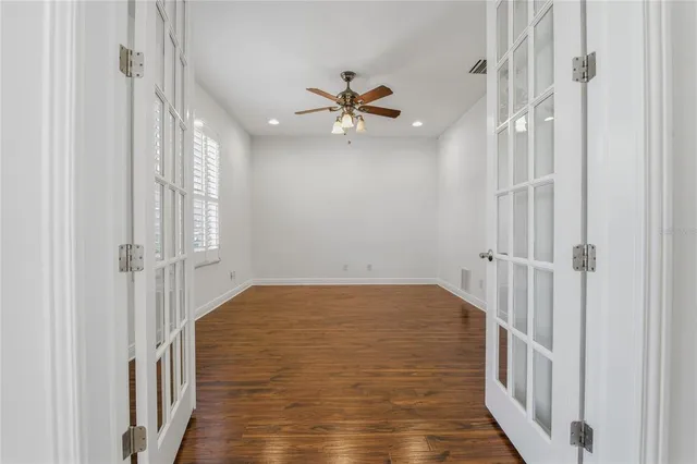 an aerial view of multiple houses with yard