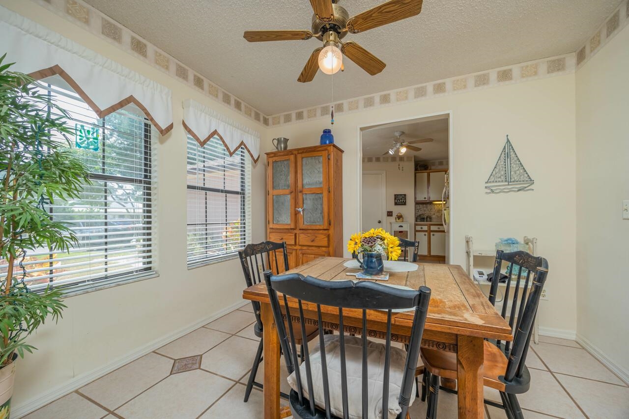 154 Drake Road St. Augustine, FL 32086 - Photo 19 of 36 a dining room with furniture and window