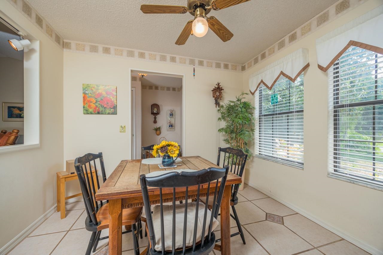 154 Drake Road St. Augustine, FL 32086 - Photo 20 of 36 a view of a dining room with furniture and window