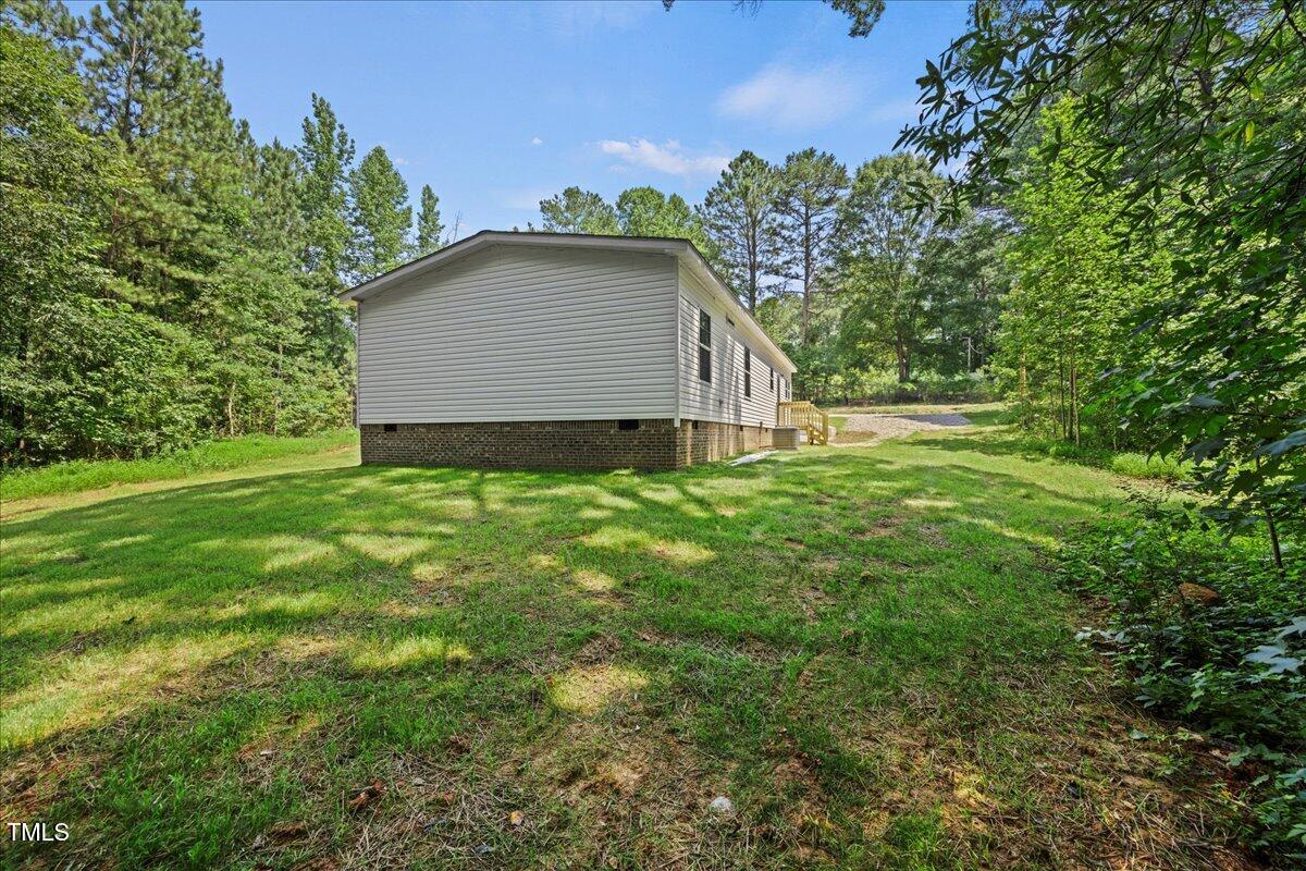1065 Shuford Road Wake Forest, NC 27587 - Photo 23 of 28 Side Yard