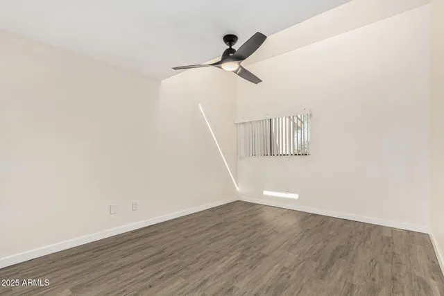 a bathroom with a granite countertop sink double and mirror