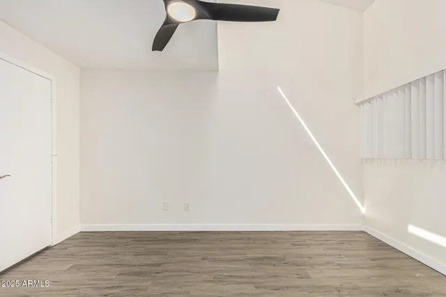 a bathroom with a shower a toilet and a sink