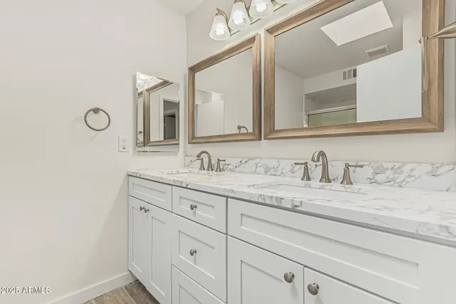 a bathroom with a mirror