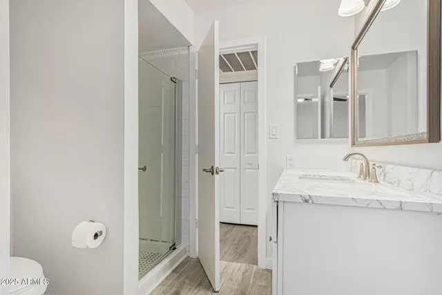 an empty room with wooden floor