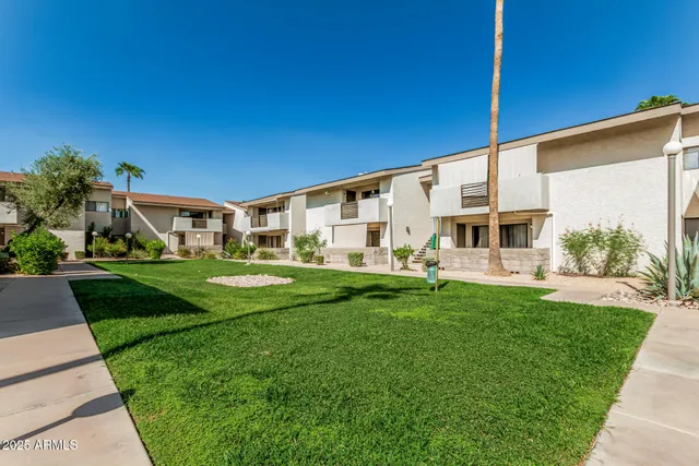 a view of a house with swimming pool