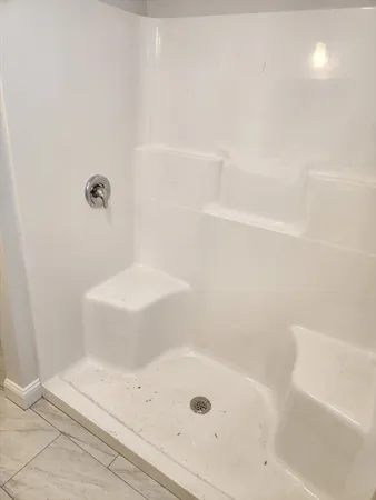 a bathroom with a bathtub