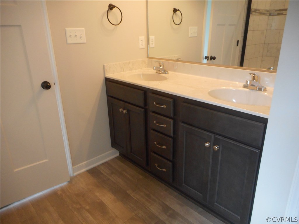 4032 Rotherham Circle Prince George, VA 23875 - Photo 8 of 10 Comfort height sinks in the master bathroom