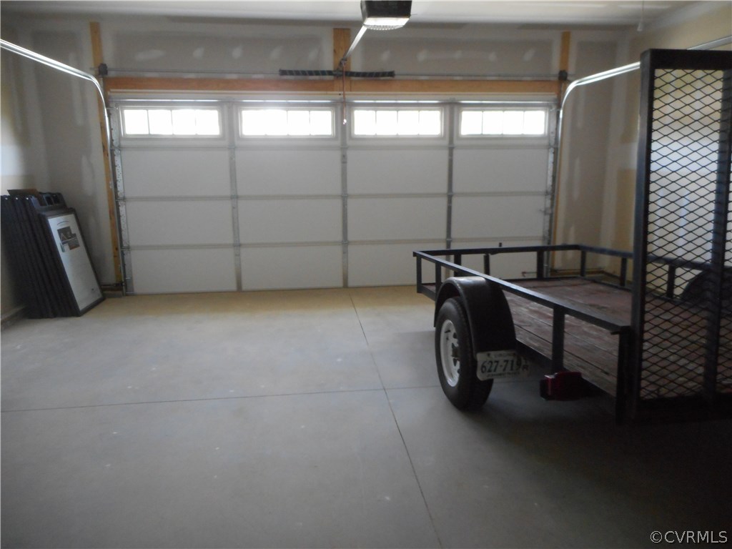 4032 Rotherham Circle Prince George, VA 23875 - Photo 10 of 10 Two car attached garage w/garage door and remotes.